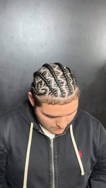 Overhead view of a spiral cornrow design